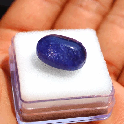 Piedra preciosa de cabujón ovalado de tanzanita natural sin tratar de primera calidad certificada de 25,75 quilates Foto 1 de 4