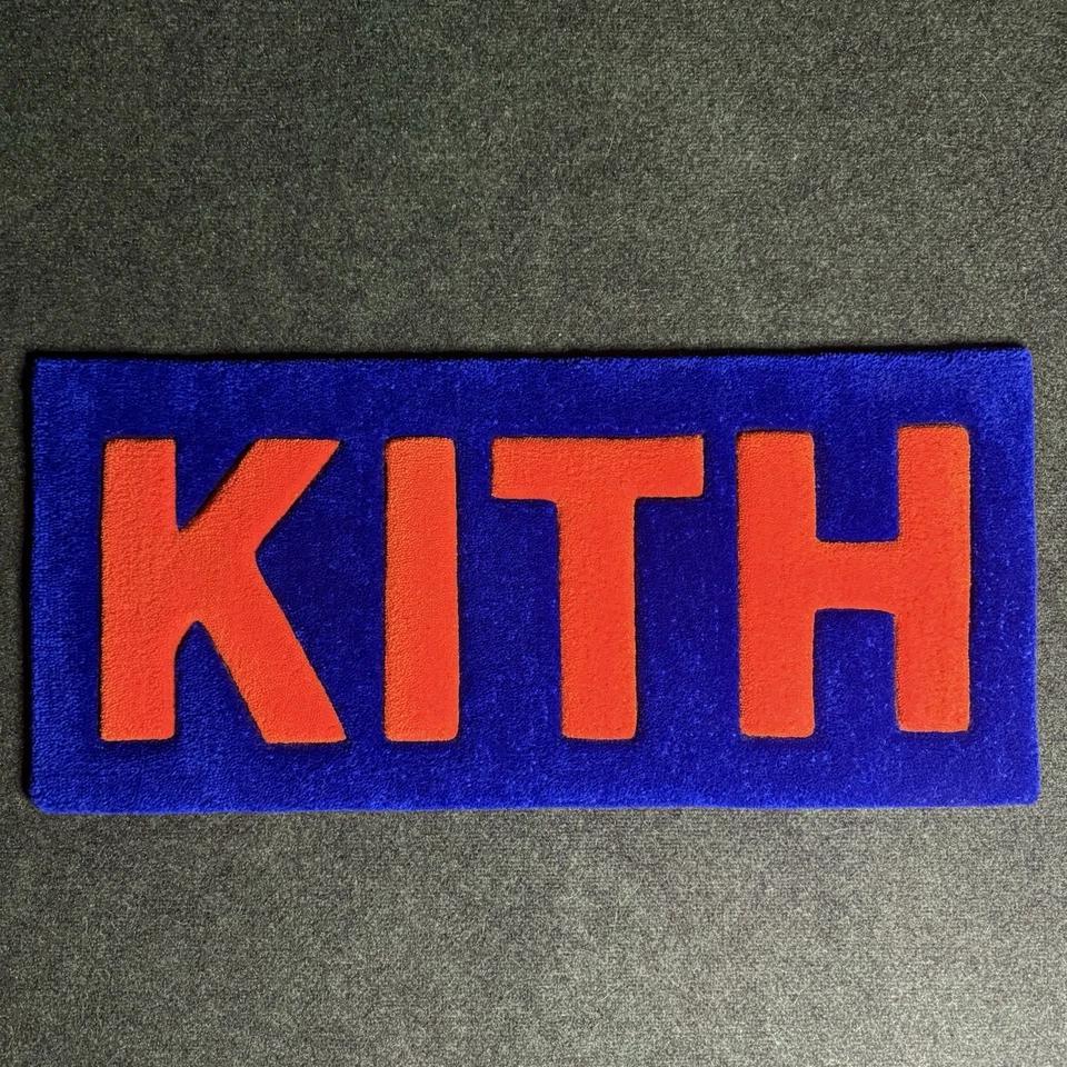 Alfombra acolchada a mano Kith - 32” x 14” - NY Knicks - azul x naranja - decoración de miel - KITH Foto 1 de 4