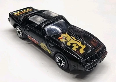 Pontiac Firebird Trans Am 1/64 negro vintage sin marca fundido a presión/plástico Foto 1 de 4