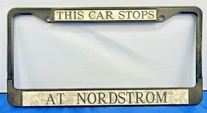 Vintage THIS CAR STOPS AT NORDSTROM Metal License Plate Frame Cover Canam - Picture 1 of 5