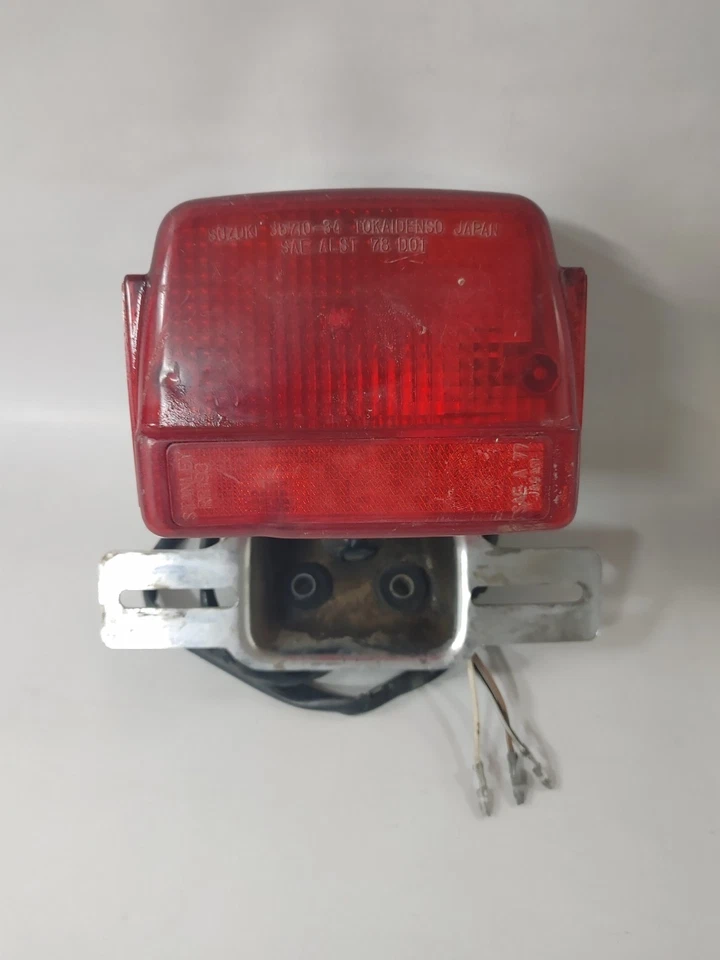 Combo lámpara trasera luz freno luz trasera Suzuki GS850 1983 35720-49130-999 Foto 1 de 4