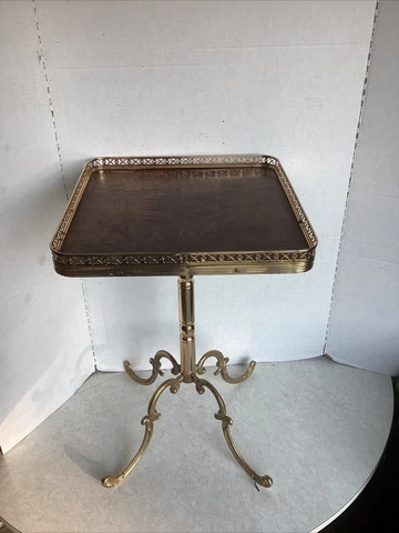 Beautiful Vintage Hall table with ornate brass legs and gold tone rail Cover