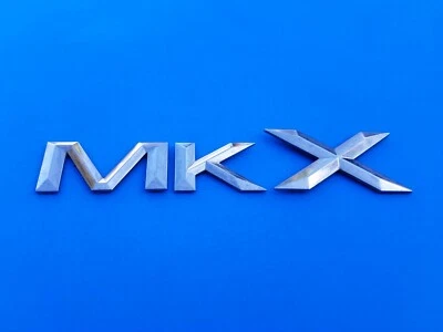 07 08 09 10 LINCOLN MKX MALETERO TRASERO CROMO EMBLEMA LOGOTIPO INSIGNIA SÍMBOLO OEM (2008) Foto 1 de 3