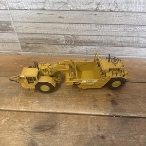 Tractor de ruedas fundido a presión Norscot Cat 657D - Imagen 1 de 10