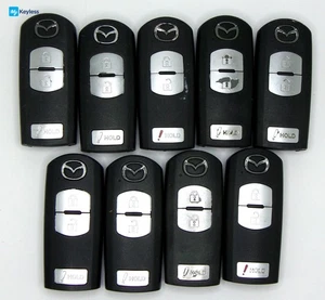 Lot x9 OEM Mazda Keyless Entry Smartkey Remotes Used TESTED WAZSKE13D01 - Picture 1 of 2