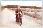 1920s RPPC MAN ON MOTORCYCLE FARM FIELDS CORN STACKS ANTIQUE REAL PHOTO POSTCARD
