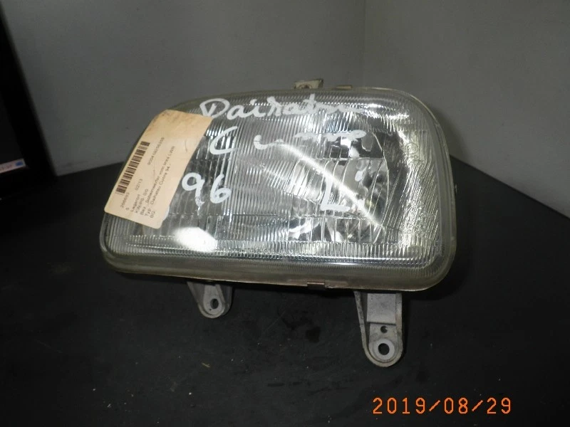 138432 Hauptscheinwerfer links DAIHATSU Cuore IV (L501) 0.8  - Bild 1 von 3
