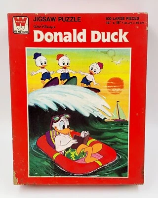 Quebra-cabeça Disney Vintage Whitman Pato Donald 100 Peças Praia de Surfe - Imagem 1 de 4