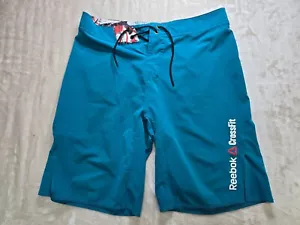 Pantalones cortos de tabla Reebok Crossfit para hombre talla 30 azul con cordón elástico - Imagen 1 de 9