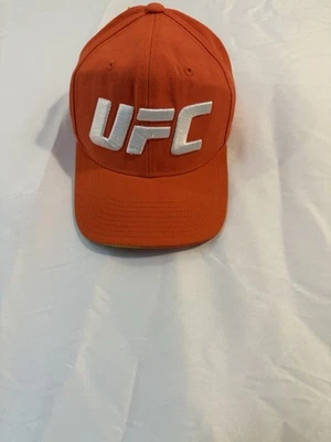 Gorra de camionero Reebok UFC para hombre con cierre a presión ajustable naranja Foto 1 de 4
