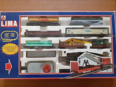 Lima grande scatola contenente un treno merci con carro gru usato pochissimo - Immagine 1 di 2