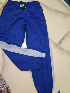 Pantalones cortavientos Nike holgados XL azul CJ5484-480 - Imagen 1 de 5