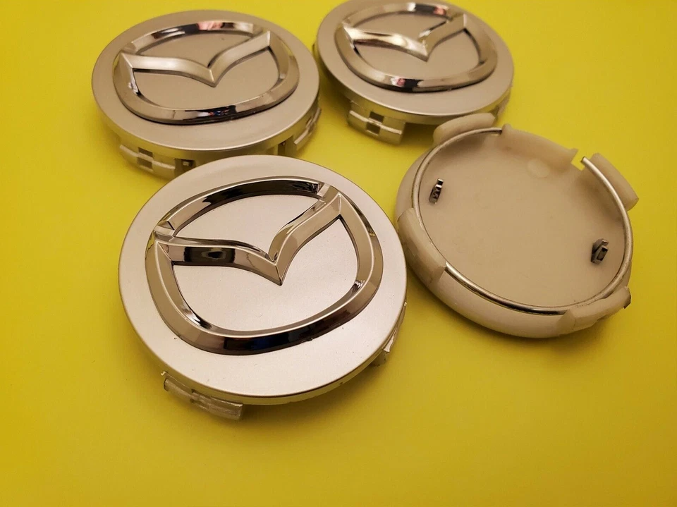 4 X MAZDA 56mm Silver Wheel Center Caps - Mazda 3/5/6, Miata, RX 8, CX-3/5/7/9.. - Image 1 of 4
