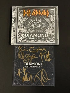 CD FIRMADO POR DEF LEPPARD BAND INSERTO DE DIAMOND STAR HALOS - CD INCLUIDO - Imagen 1 de 2