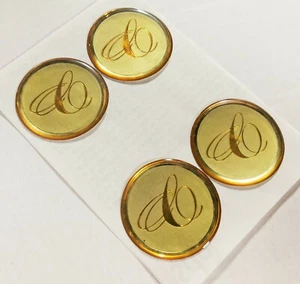 4 NOS Cadillac McLean 1 3/4" Gold & Gold Wire Wheel Emblems - Picture 1 of 2