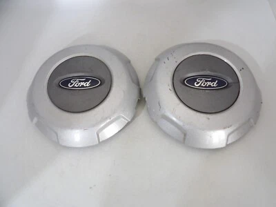 Par de tapas centrales de rueda plateadas OEM FORD F-150 2004 2005 2006 2007-2008 Foto 1 de 4