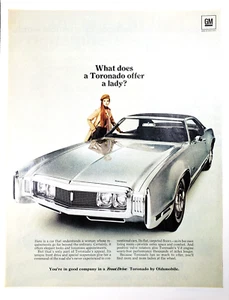 PRINT AD 1969 Oldsmobile What Does Toronado Offer a Lady Silver Car 10.5x13 - Picture 1 of 1
