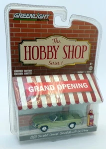 Greenlight Hobby Shop 1/64 Scale 97010 - 1969 Chevrolet Camaro & Gas Pump Green - Picture 1 of 2