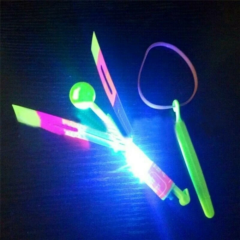  Spielzeug   Schleuder LED  Propeller Schleuder  Helikopter Flieger  NEU.  - Bild 1 von 4