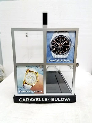 Bulova Caravelle rotating watch display case with lock and key - Image 1 of 4