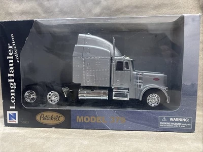 Peterbilt Semi Model 379. New ray. Silver Long Haul Truck 52803 - Image 1 of 4
