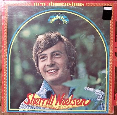 SHERRILL NIELSEN  NEW DIMENSIONS  WOODSTOCK RECORDS  EXC  VINYL LP 191-33 - Bild 1 von 4
