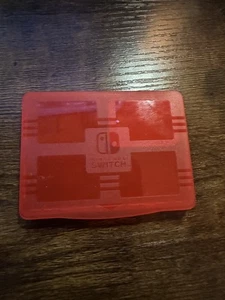 Offizielle Nintendo Switch Hülle 4 Spiele Cartridge Halter Rot mit microSD Card Case - Bild 1 von 3