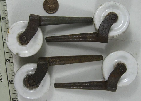 4 Antique Furniture Castors Metal With Porcelain Wheels #1 Cover