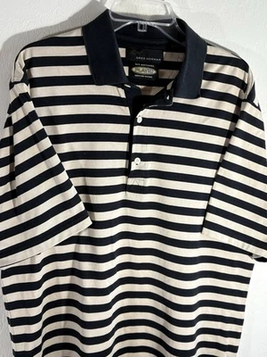 Polo Greg Norman Hombre Golf Grande Negro Dorado Capa Seco Absorbe Humedad Rendimiento Foto 1 de 4