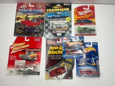 RACING CHAMPIONS, HOT WHEELS LOT OF 7 DODGE DAYTONA / SUPERBIRD NASCAR NEW MOC - Image 1 of 4