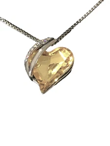 Fashion necklace with a Heart, a Yellow One on a Silver-Colored Chain - Picture 1 of 1