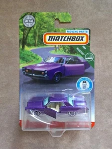 Pontiac Grand Prix 1964 piezas móviles Matchbox púrpura - Imagen 1 de 4