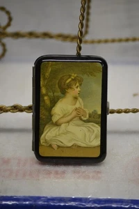 CIGARRILLO VINTAGE CON ESTUCHE DE NIÑA CARGADO CON RESORTE - Imagen 1 de 2