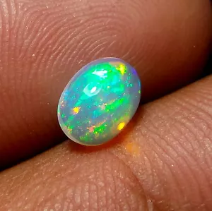 8x6 mm Natur AAAA Qualität Regenbogen Feuer Spiel Äthiopischer Opal ovale Form Cabochon - Bild 1 von 4