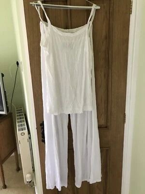 White New Designer Besutiful Soft Cotton Top And Elastic Waist Flarred Trousers  - Image 1 of 4