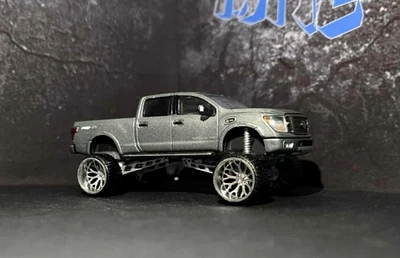 1/64 Lifted Nissan Titan SEMA Style Greenlight Auto World Hot Wheels - image 1 of 4