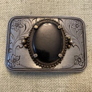 De colección. Hebilla de cinturón de metal con piedra central negra floral - Imagen 1 de 7