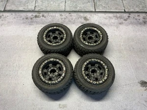 Pro-Line Racing Titus 2.2" Beadlock Wheels Dirt Hawg Tires RARE! For E Revo 1/16 - Picture 1 of 8