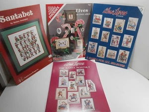 9 Different CHRISTMAS THEMED Santa/+ CROSS STITCH PATTERN BOOKS - Picture 1 of 2