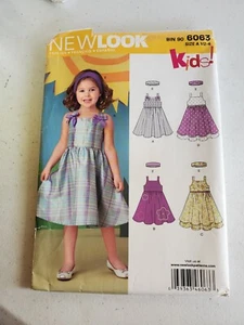 New Look 6063 Fabric Sewing Pattern Girls Sun Dress Sizes 1/2 to 4 In 3 Styles - Picture 1 of 3