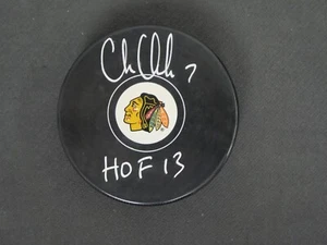 CHRIS CHELIOS SIGNED CHICAGO BLACKHAWKS TEAM HOCKEY PUCK INSCRIBED "HOF 13" - Picture 1 of 2