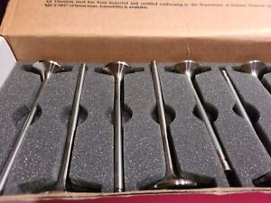 New  7mm. exhaust valves measuring 1.625"and 5.750" length. new old stock 2008.