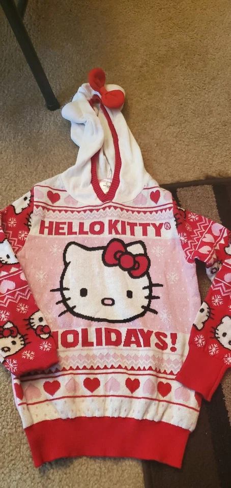 Hello Kitty Holiday Niñas Rosa Suéter Con Corazones Y Copos De Nieve Talla Pequeña  Foto 1 de 1