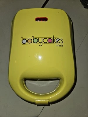 Mini antiadherente para hacer donas de postres para hacer pasteles amarillos de trabajo probado Foto 1 de 4