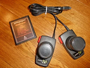 Controladores de paletas Atari 2600 con juego Street Racer - Imagen 1 de 12