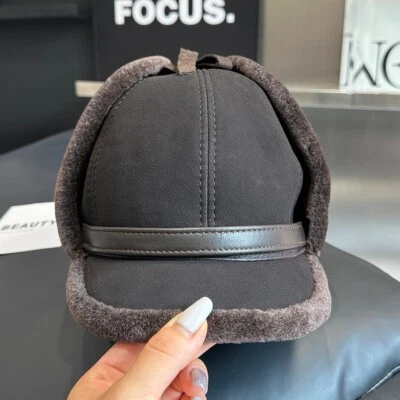 Sombrero de piel de esquila de oveja real para hombre cálido gorra de pico sombrero de cazador ruso orejeras Foto 1 de 4