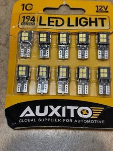 AUXITO 194 Lampadina LED 6000K Bianco 168 2825 W5W T10 Cuneo 14-SMD Lampadine Interno Auto - Foto 1 di 8