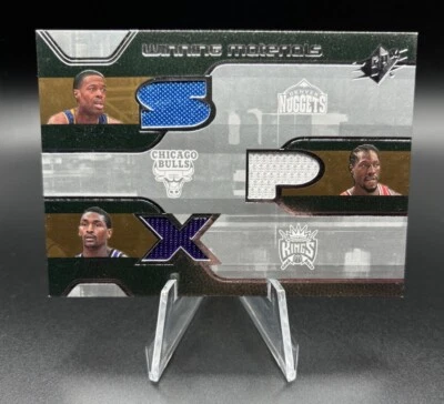 Parche triple jersey ganador 2007-08 UD SPx Marcus Camby Ben Wallace Ron Artest Foto 1 de 2