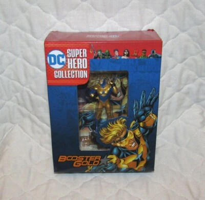 Figura y folleto de oro de refuerzo de la colección de superhéroes de DC Eaglemoss - La caja tiene desgaste Foto 1 de 4