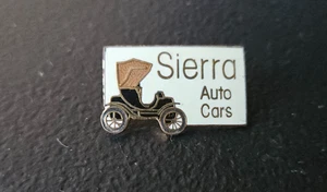 SIERRA AUTO CARS, RECUERDO PINBACK LAPAL / SOMBRERO PIN. ESMALTE BLANCO. Milestone 1986 - Imagen 1 de 5